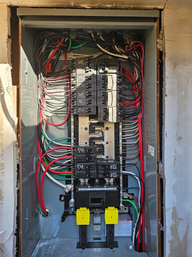 Newly upgraded electrical panel with labeled breakers
